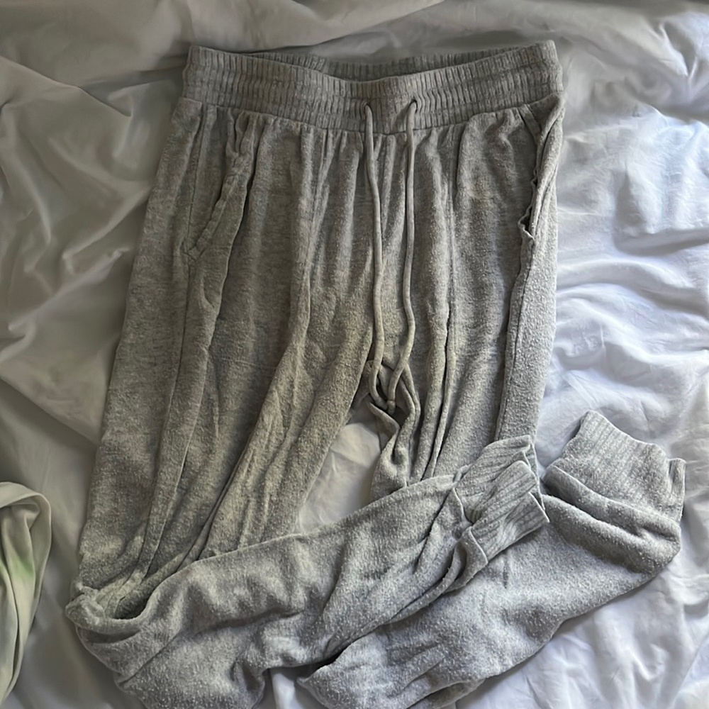 Light gray stars above joggers, not worn often, size XS